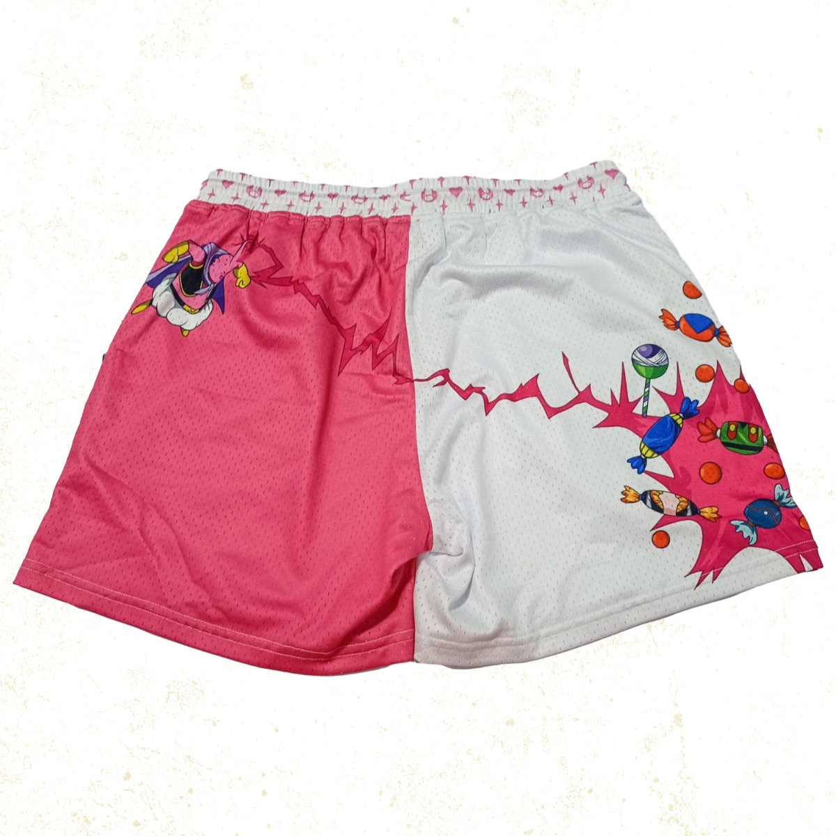 Light pink and white shorts with soft, bubble-like patterns and a playful, genie-like figure, exuding an air of mischievousness and transformation.